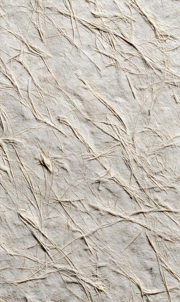 Delicate texture of natural handmade paper showing subtle fibers for organic and tactile aesthetic backgrounds design photo