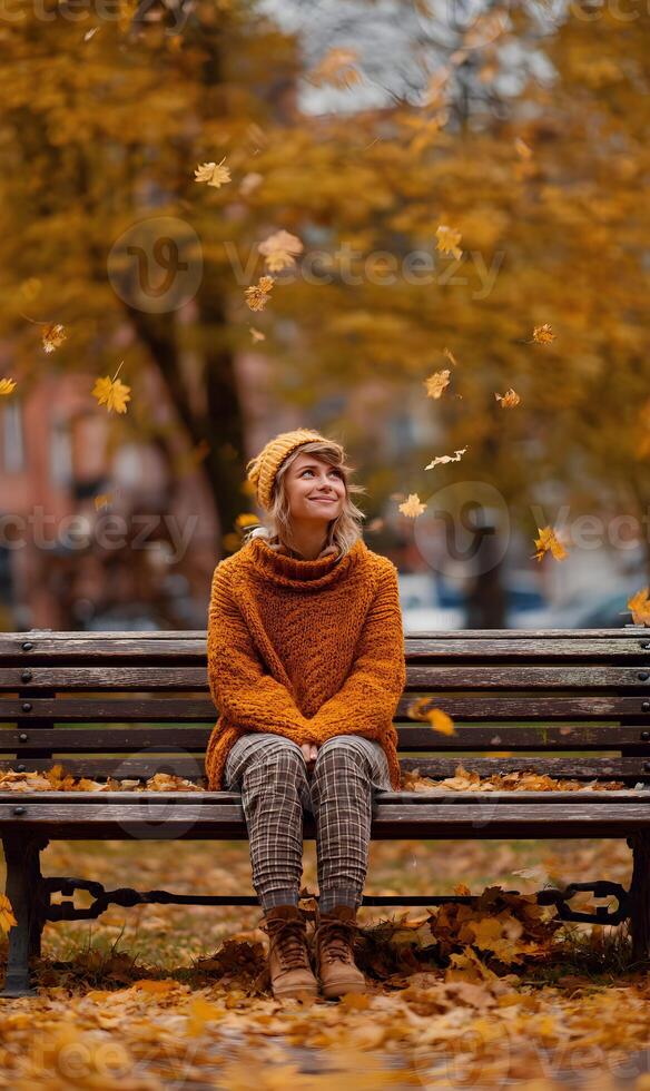 Autumn serenity a young woman enjoys the falling leaves while sitting peacefully on a park bench photo