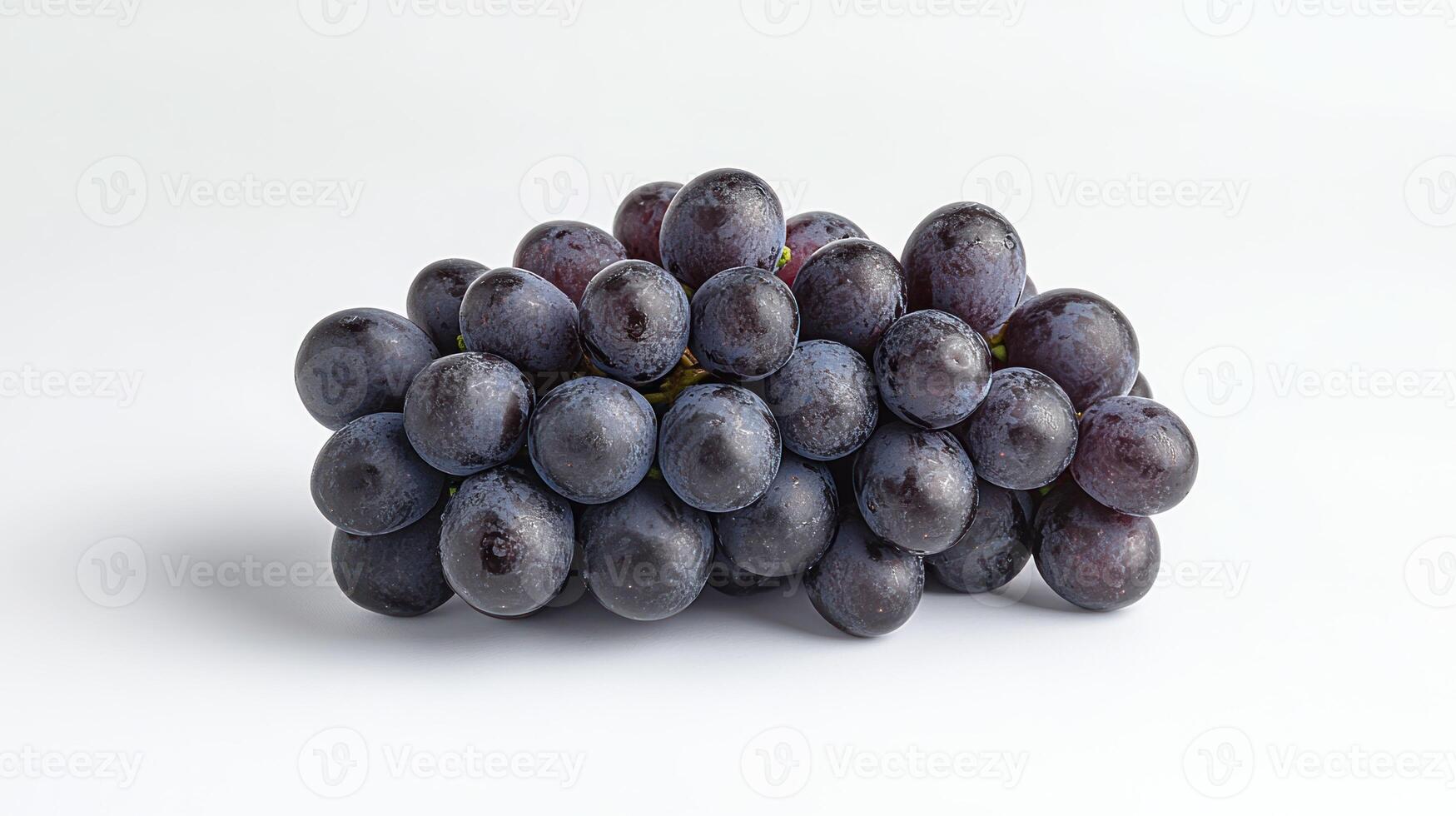 Fresh bunch of dark purple grapes photo