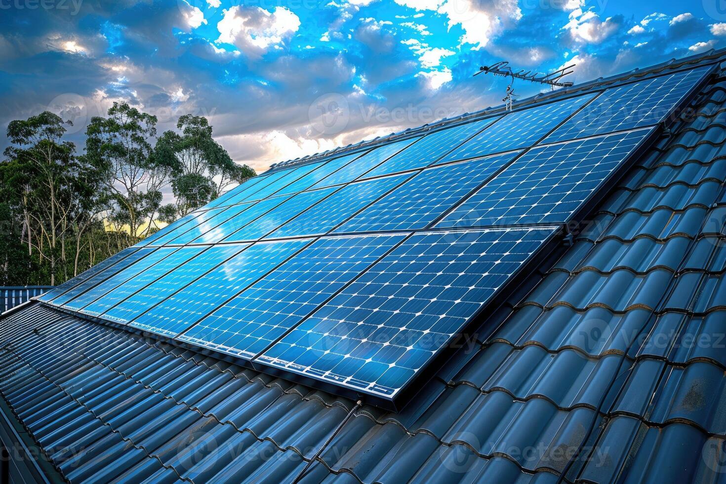 Solar Panels Installed on a Residential Roof Under a Blue Sky photo