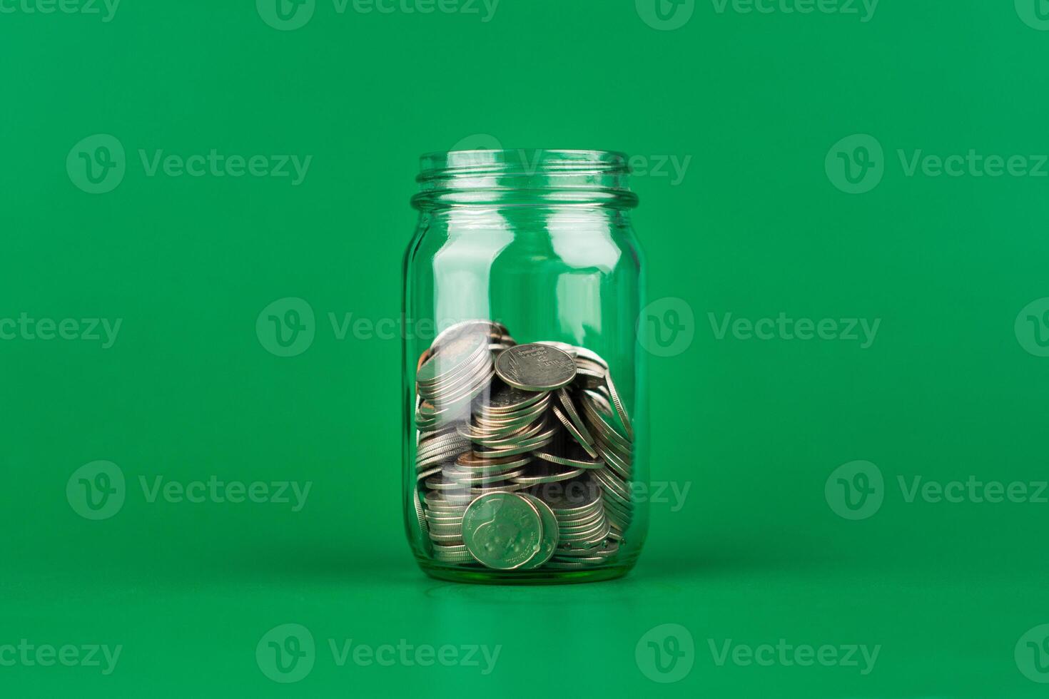 Saving Coins in Glass Bottles, Money, Financial Planning and Investment photo