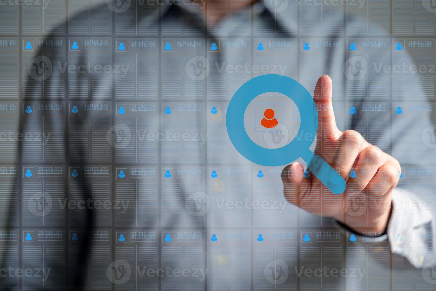 The Business man work point finger seek data to find a new job icon are floating on screen photo