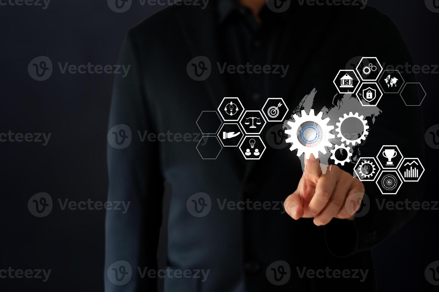 The Business man use finger point to digital and techology icon floating on screen photo