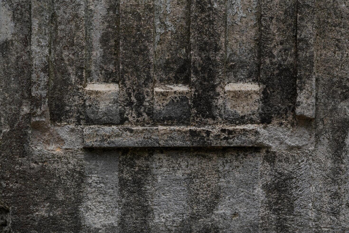 The design of an old, shabby, dirty column. The column in close-up photo