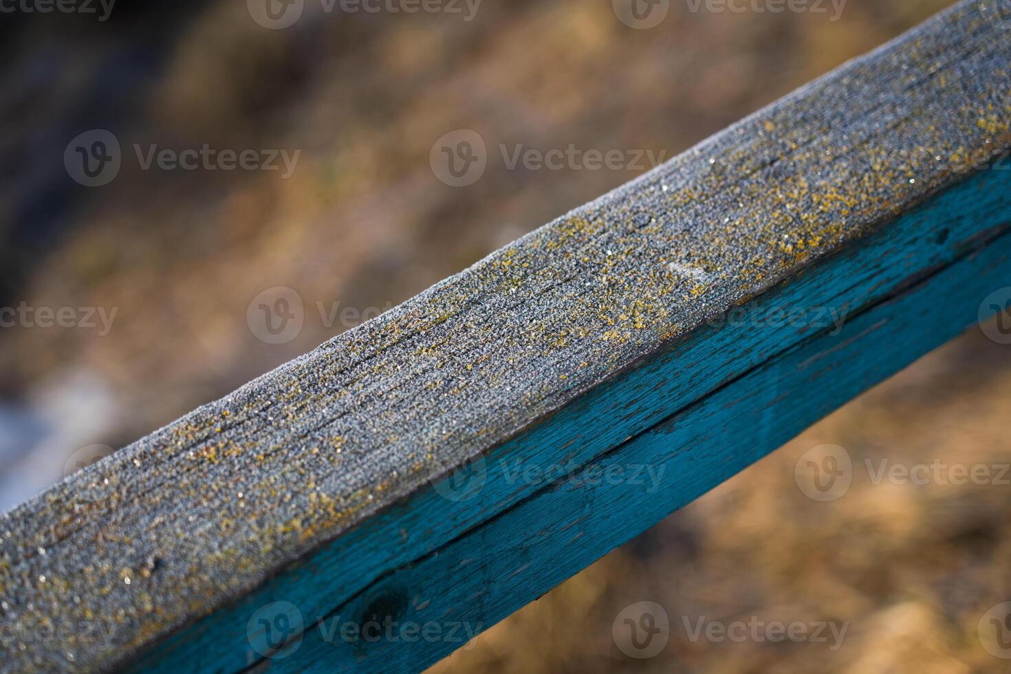Frost on wooden railings fences. Frost. Macro Diagonal lines photo