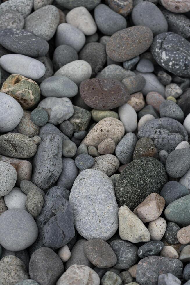 Stones background top view, stone beach background beach in Batumi photo