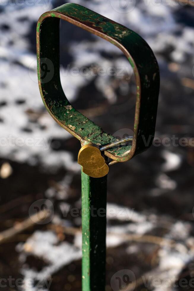 Iron, old handrails with a lock on them Love lock on the railing photo