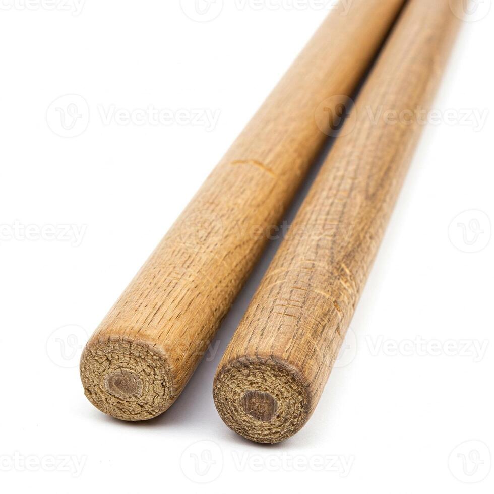 Closeup of Old Drum Sticks isolated on white photo