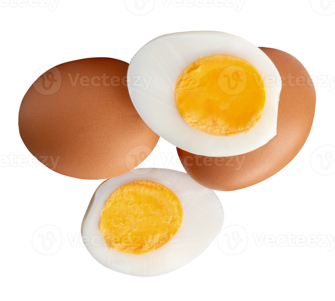 Two raw chicken eggs and peeled cooked or boiled egg with egg yolk in two halves in strange stack isolated with clipping path in file format png