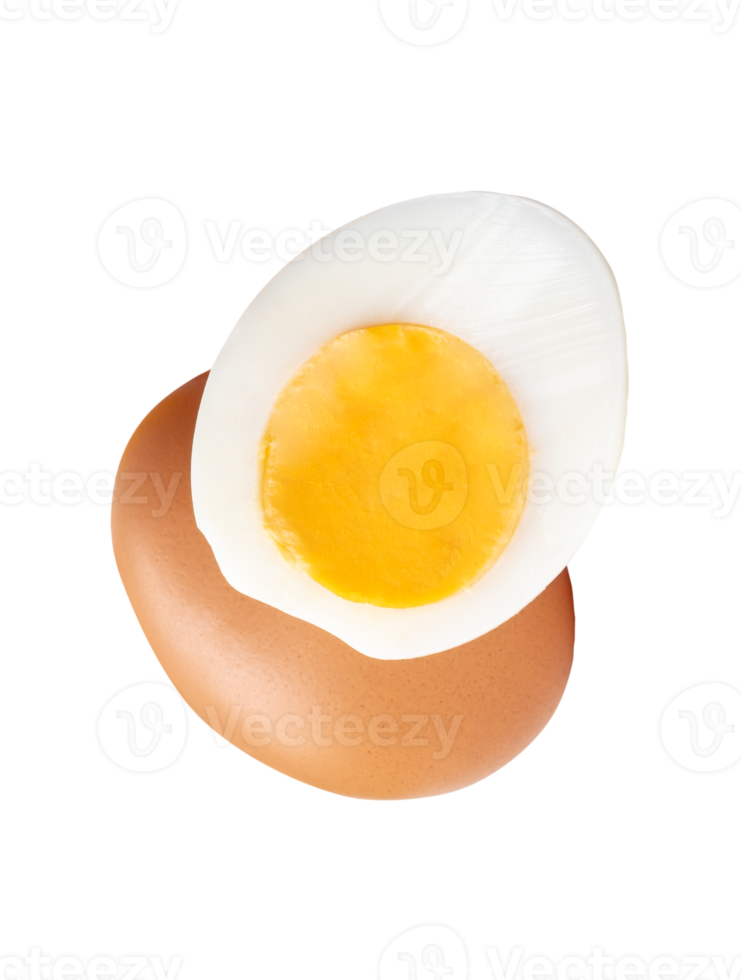 Cream chicken egg and cooked or boiled chicken egg with egg yolk in half in small pile isolated with clipping path in file format png