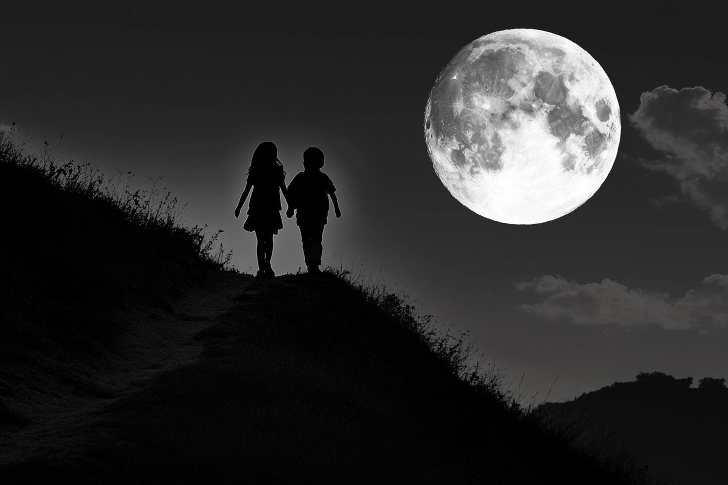 Two people walking up a hill with a full moon in the background photo