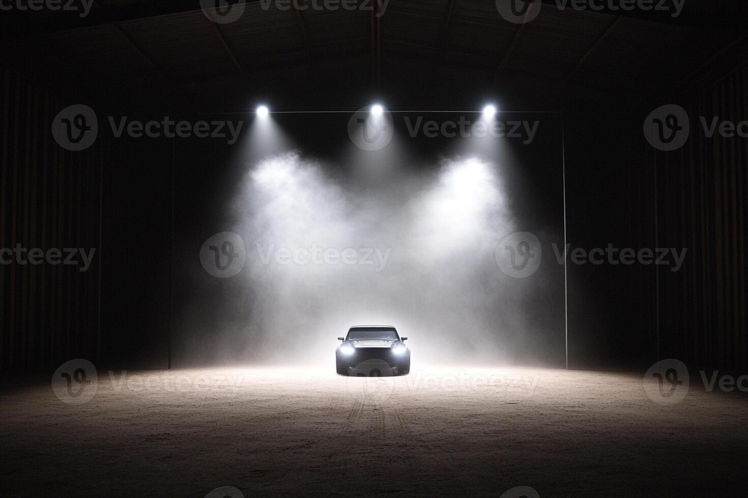 A car in a dark room with smoke coming out of the ceiling photo