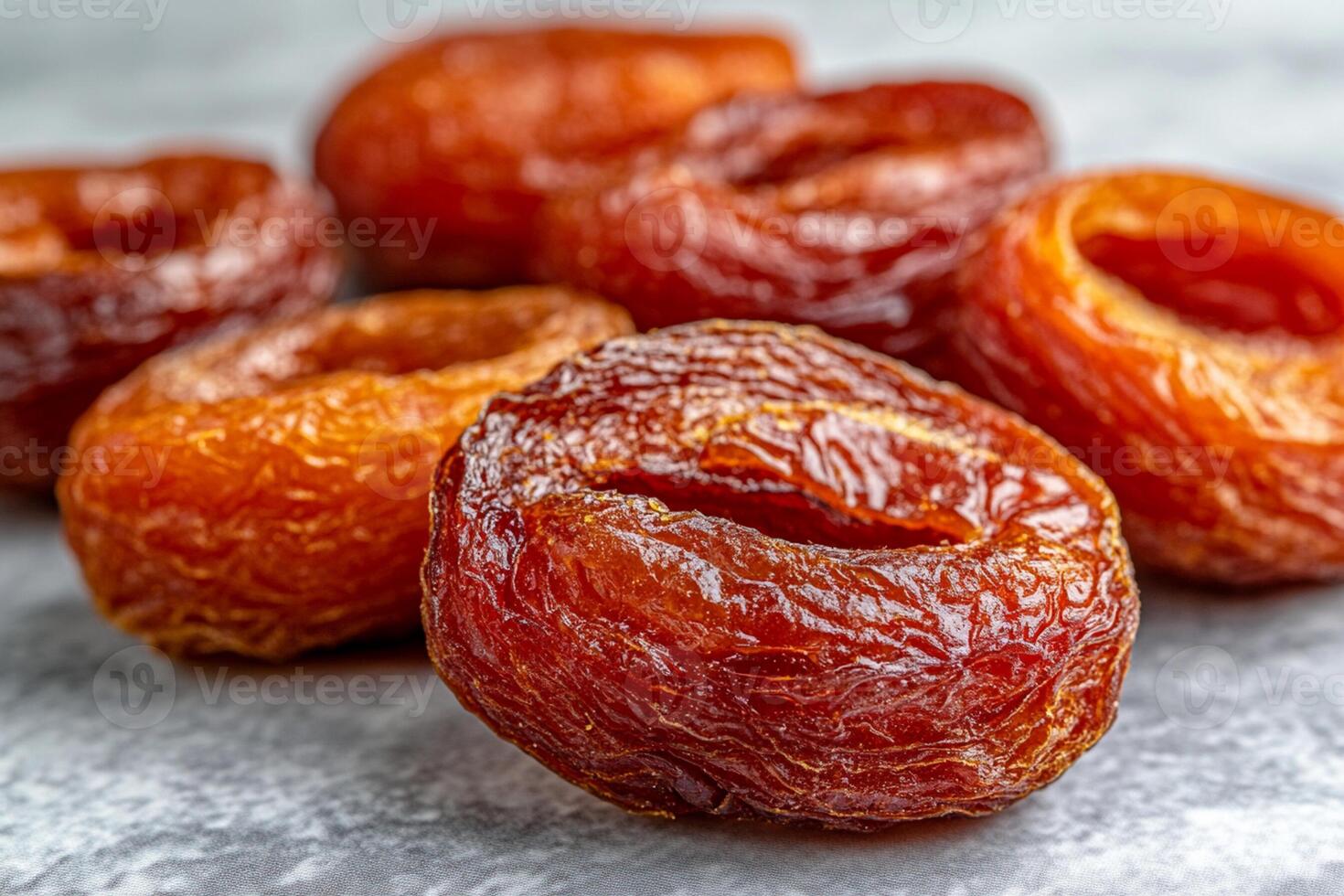 Dried apricots on a gray surface photo