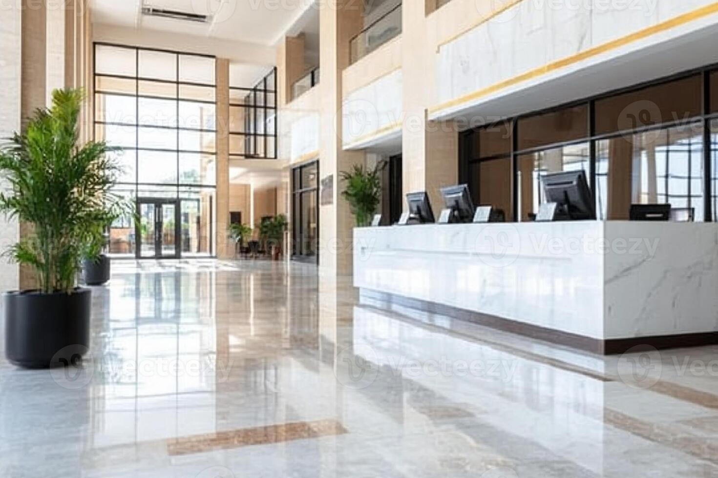 Modern hotel lobby with marble floor and large windows photo