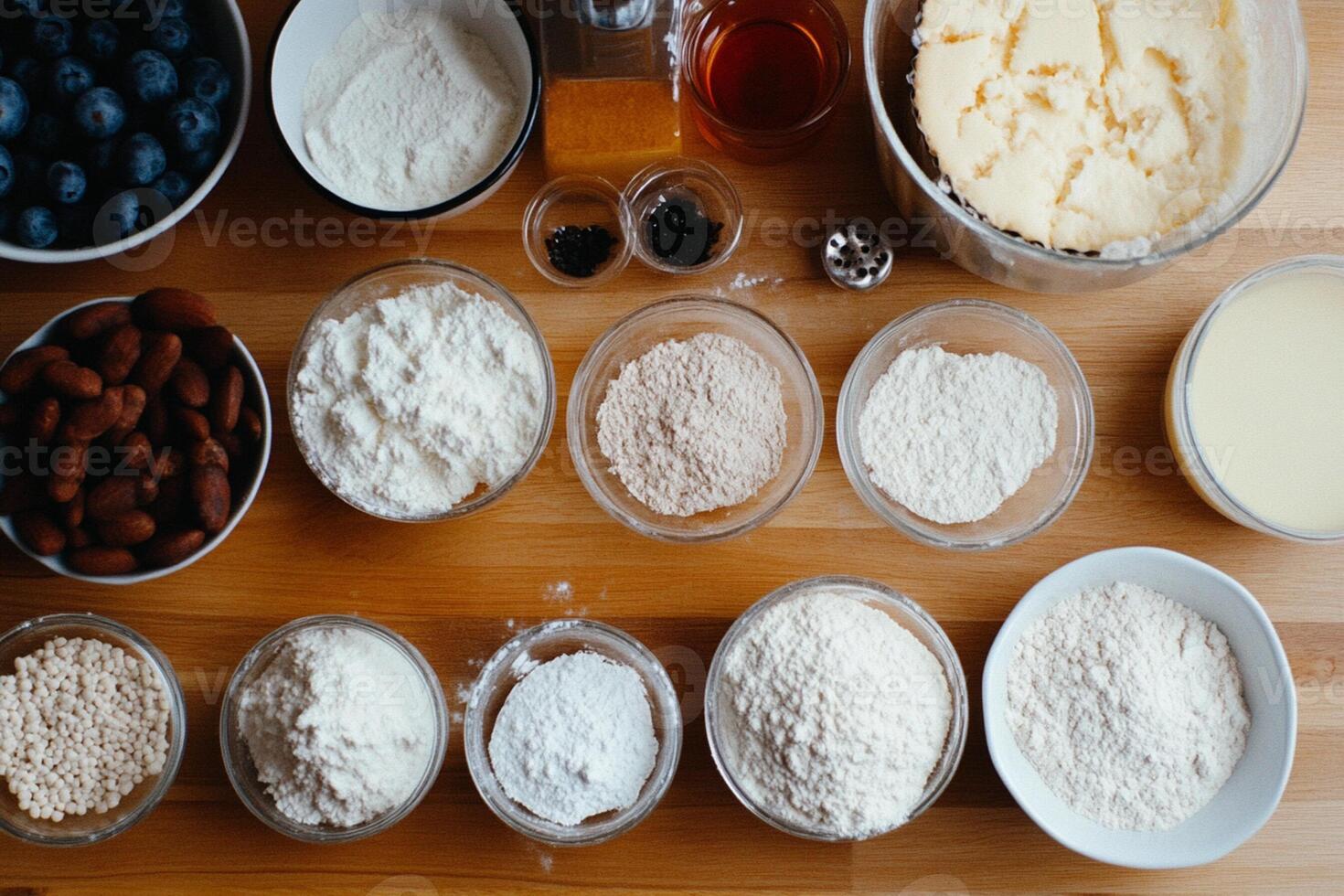 Ingredients for a cake on a wooden table photo