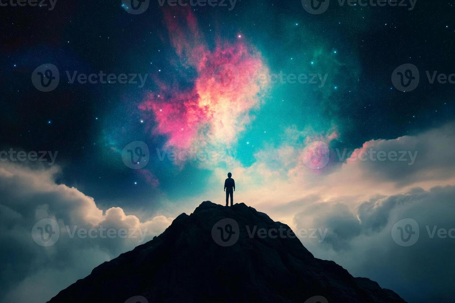 Man standing on top of mountain with colorful sky and stars photo