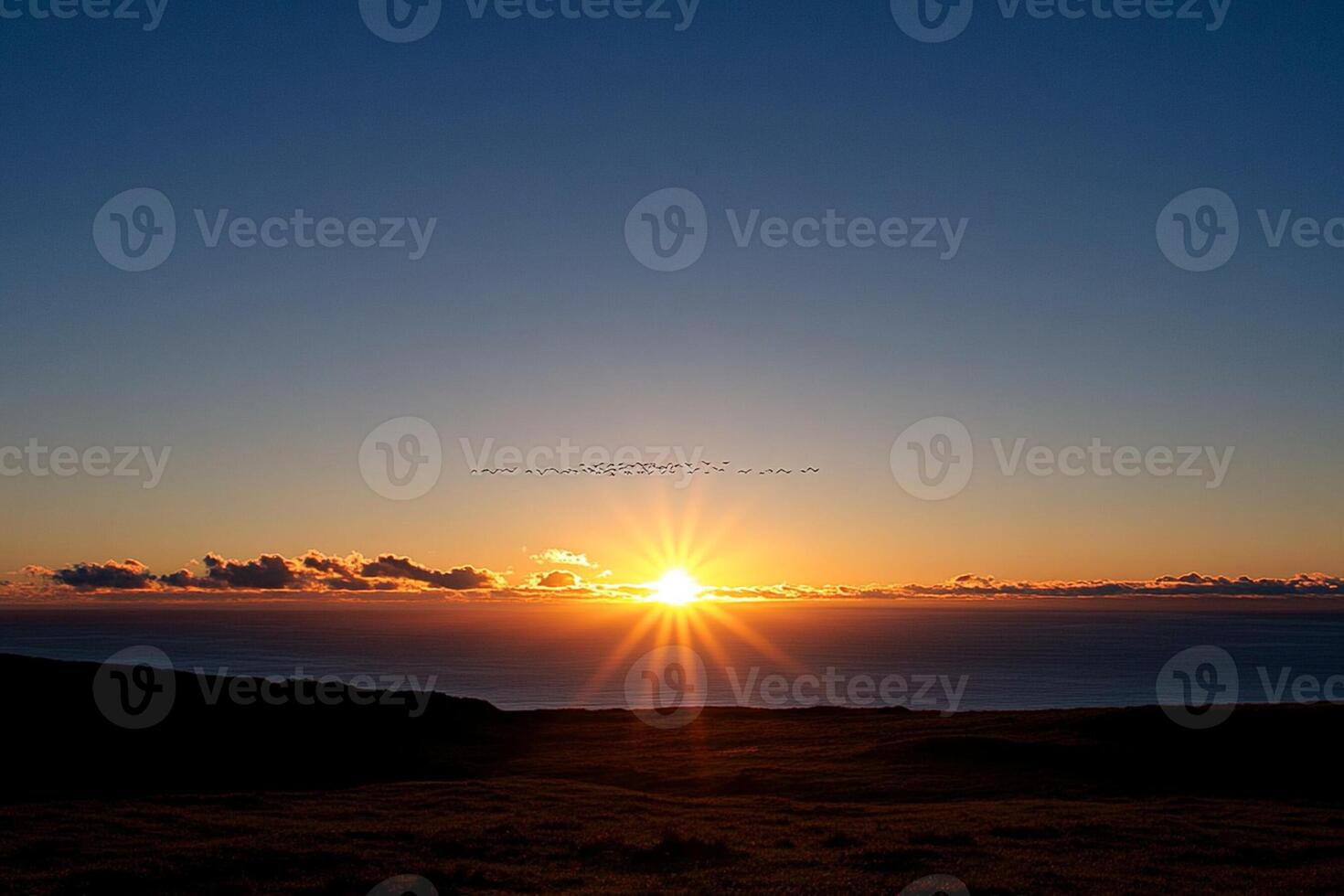 Sunset over the ocean in hawaii photo