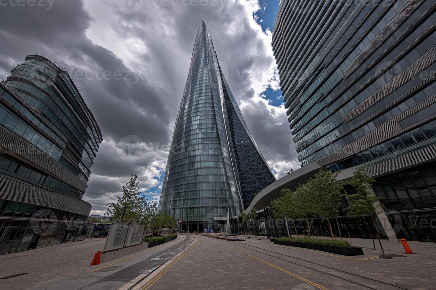 A large building with a tall tower in the background photo
