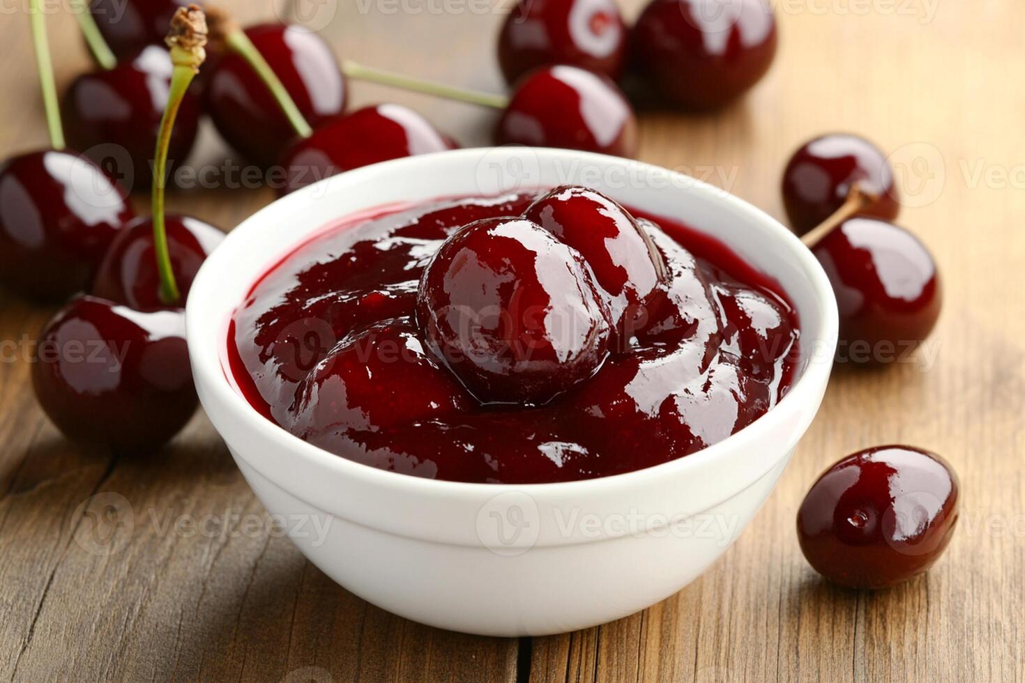Cherry jam in a bowl photo
