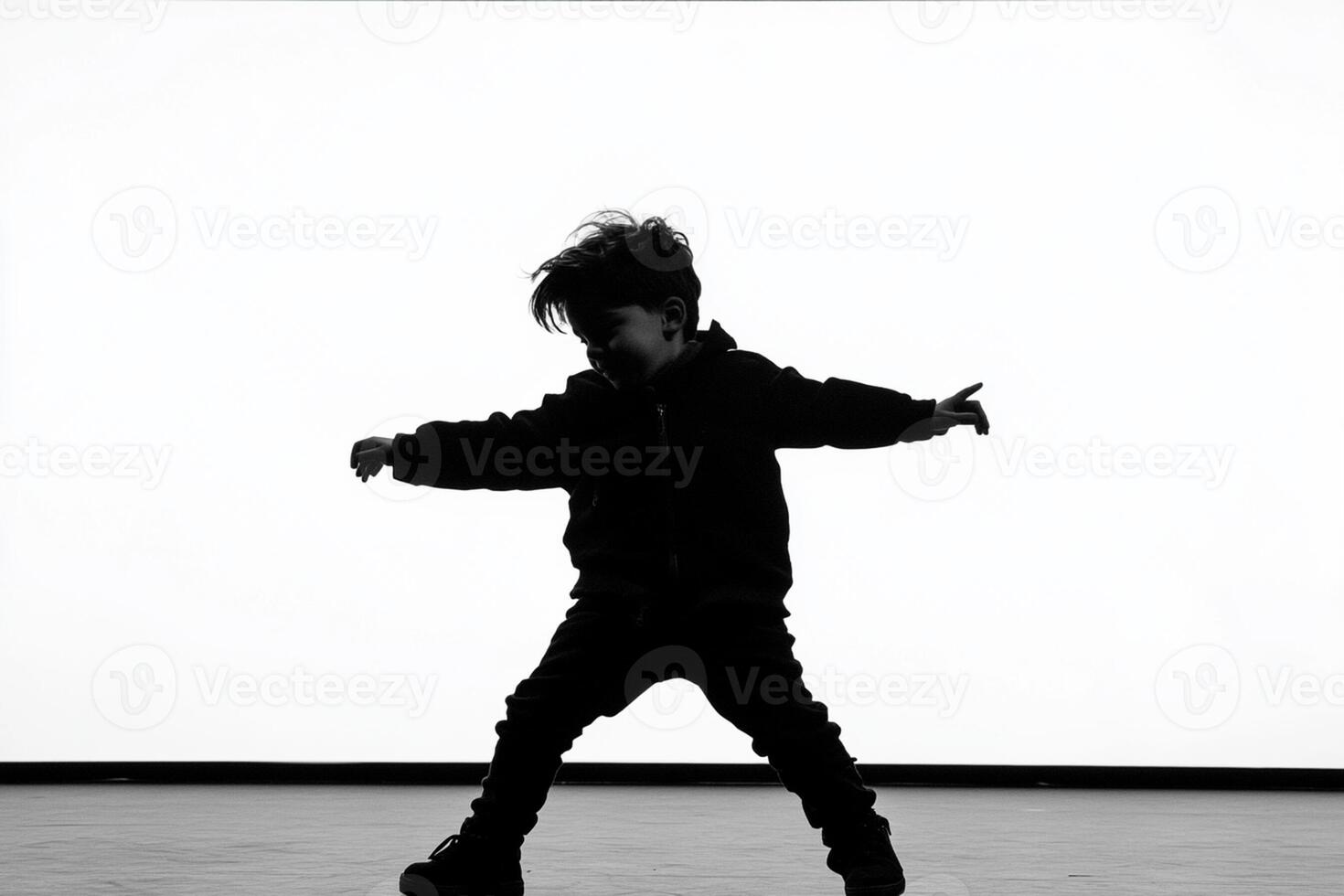A young boy in a black and white photo