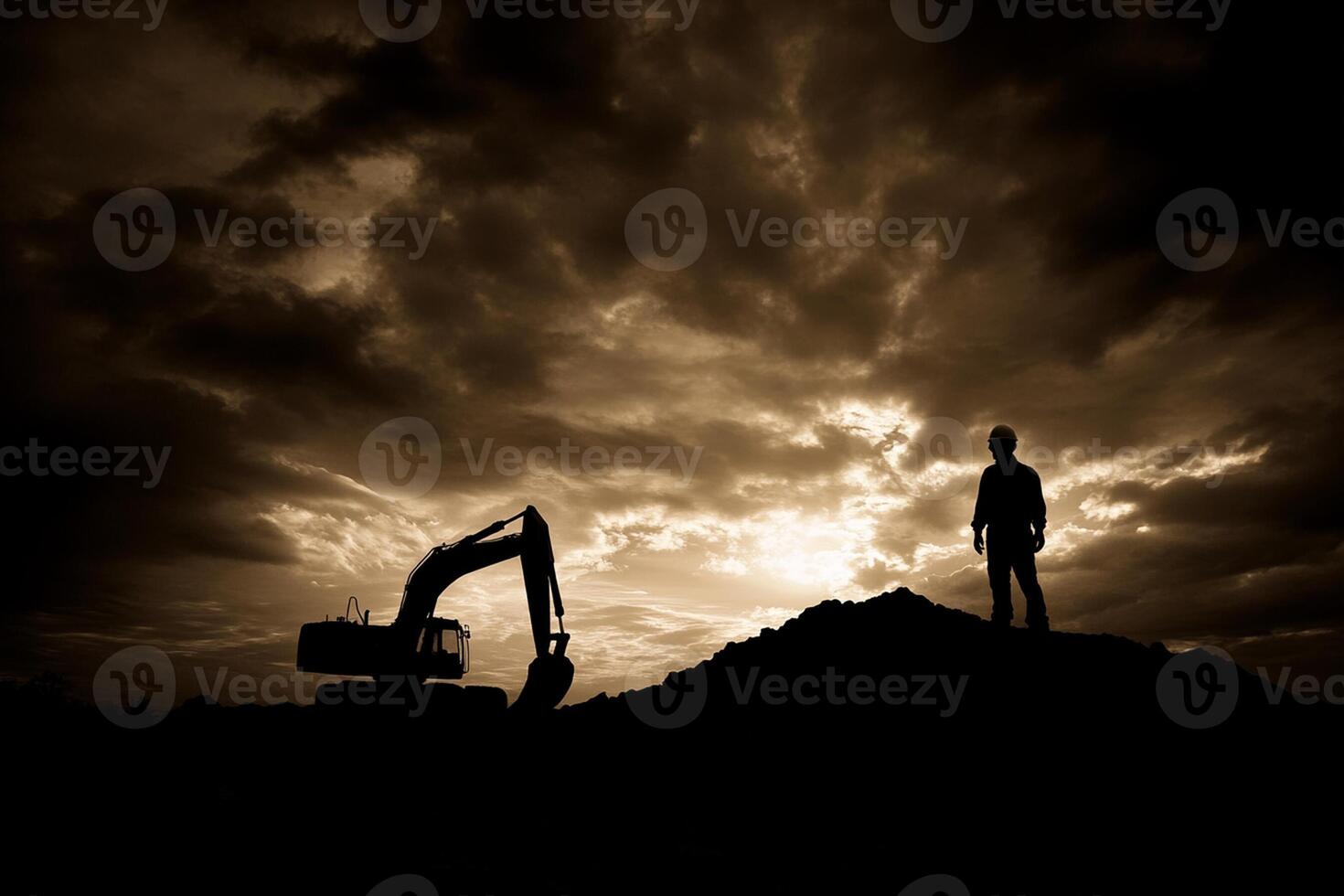 A man standing on a hill with an excavator photo