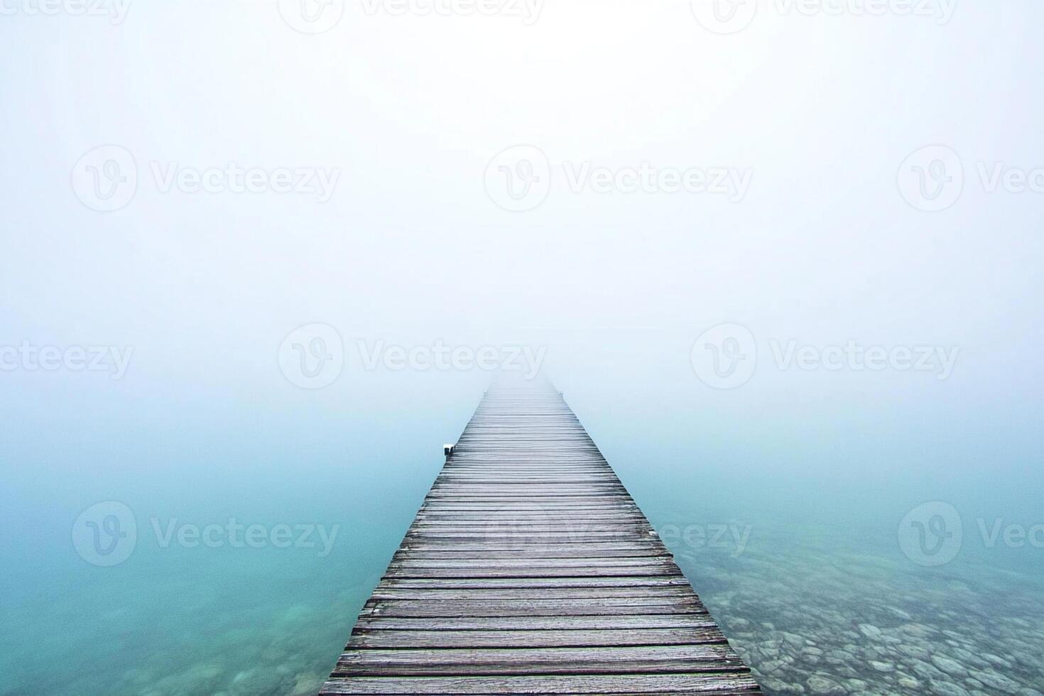 A wooden pier in the fog photo