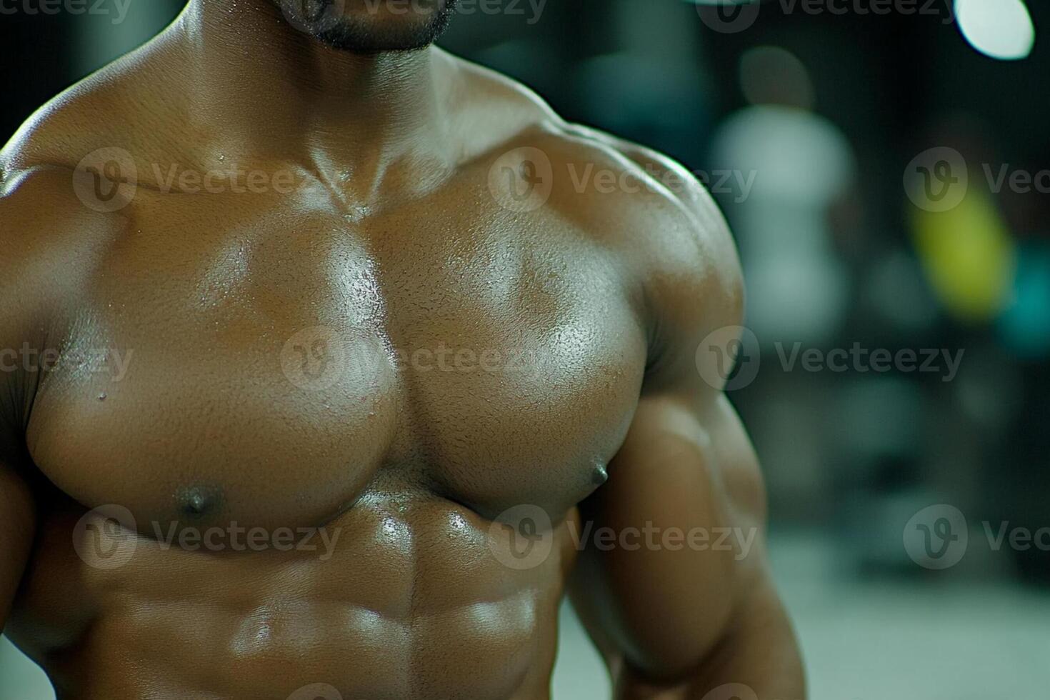 A close up of a man's chest with no shirt on photo