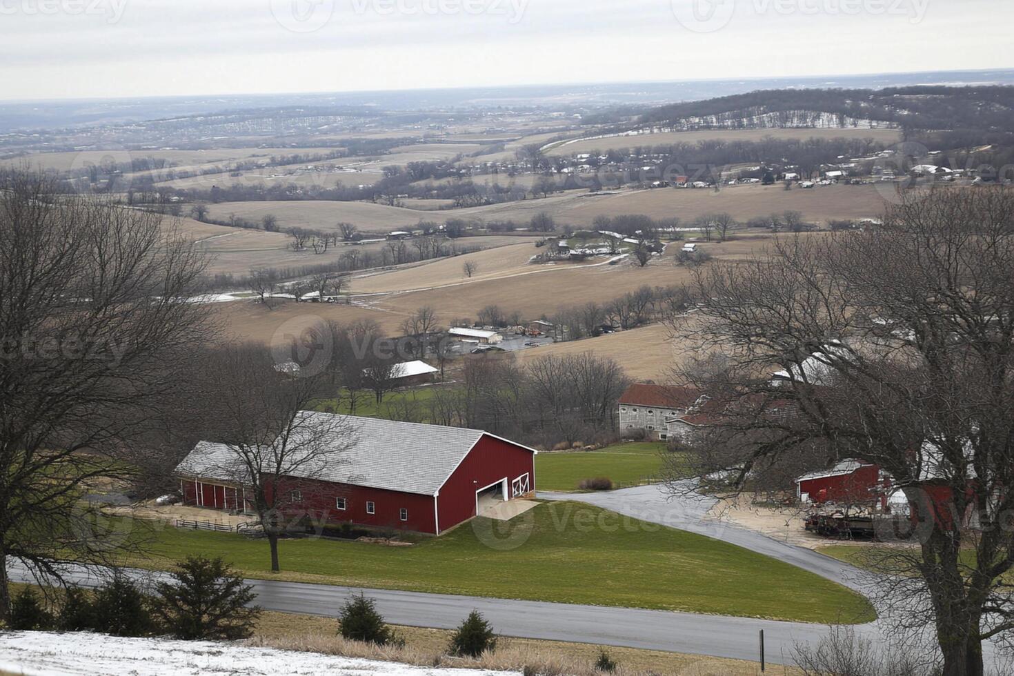 A red barn with a road in front of it photo