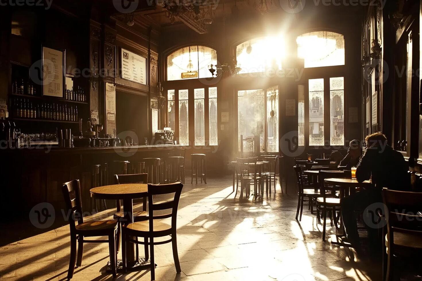 The sun shines through the windows of a restaurant photo