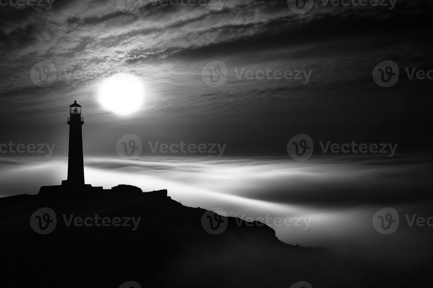 A black and white photo of a lighthouse in the fog