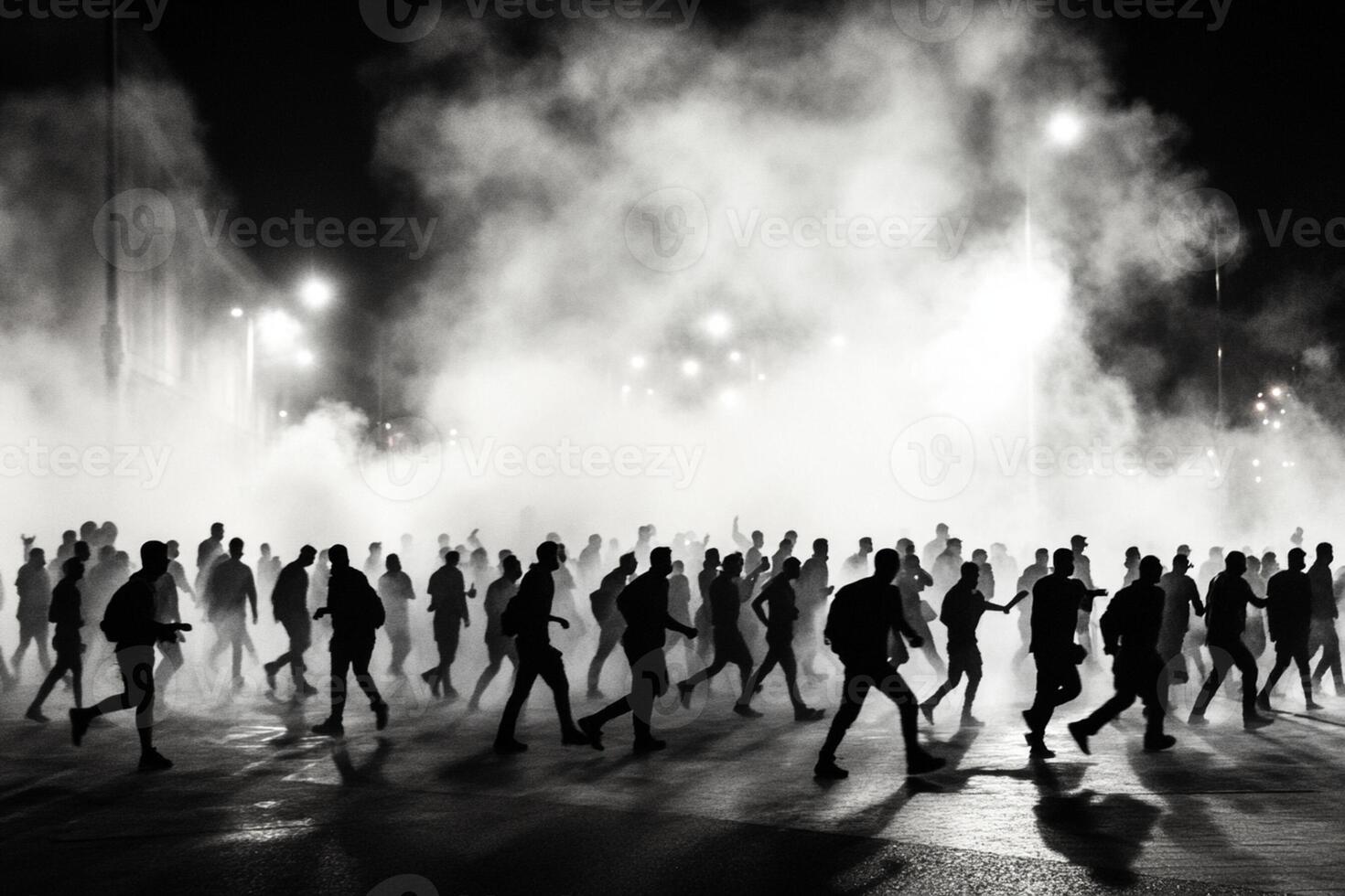 A group of people walking in the street with smoke coming out of them photo
