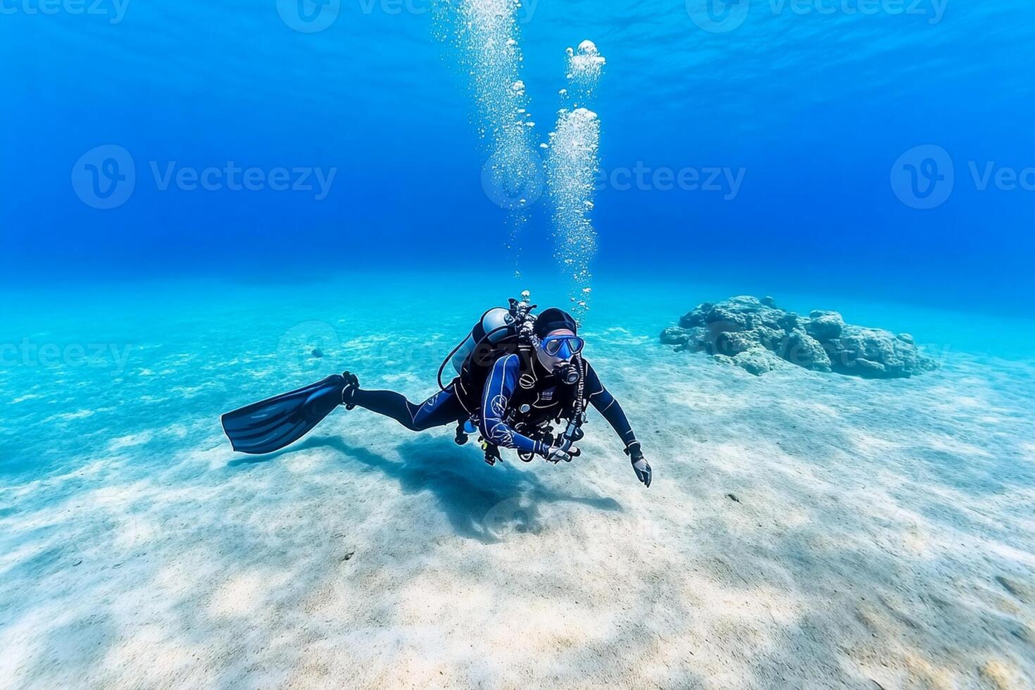 A scuba diver in the ocean photo