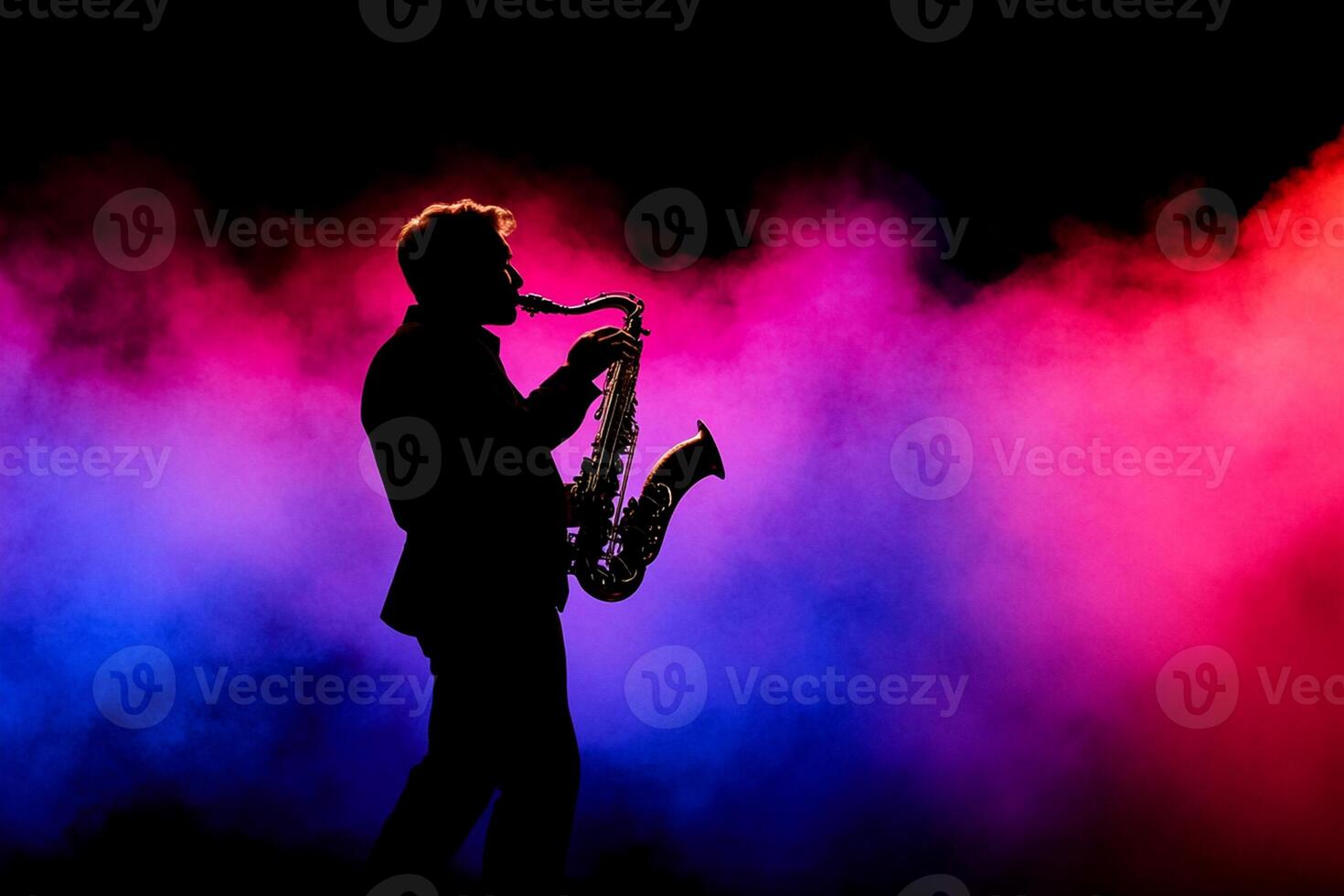 A man playing saxophone in front of colorful smoke photo
