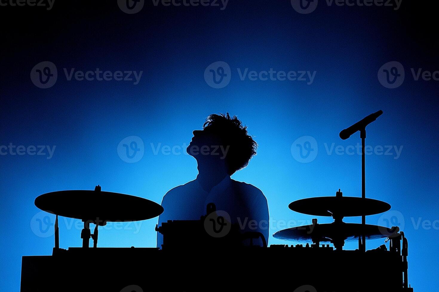 A man playing drums photo