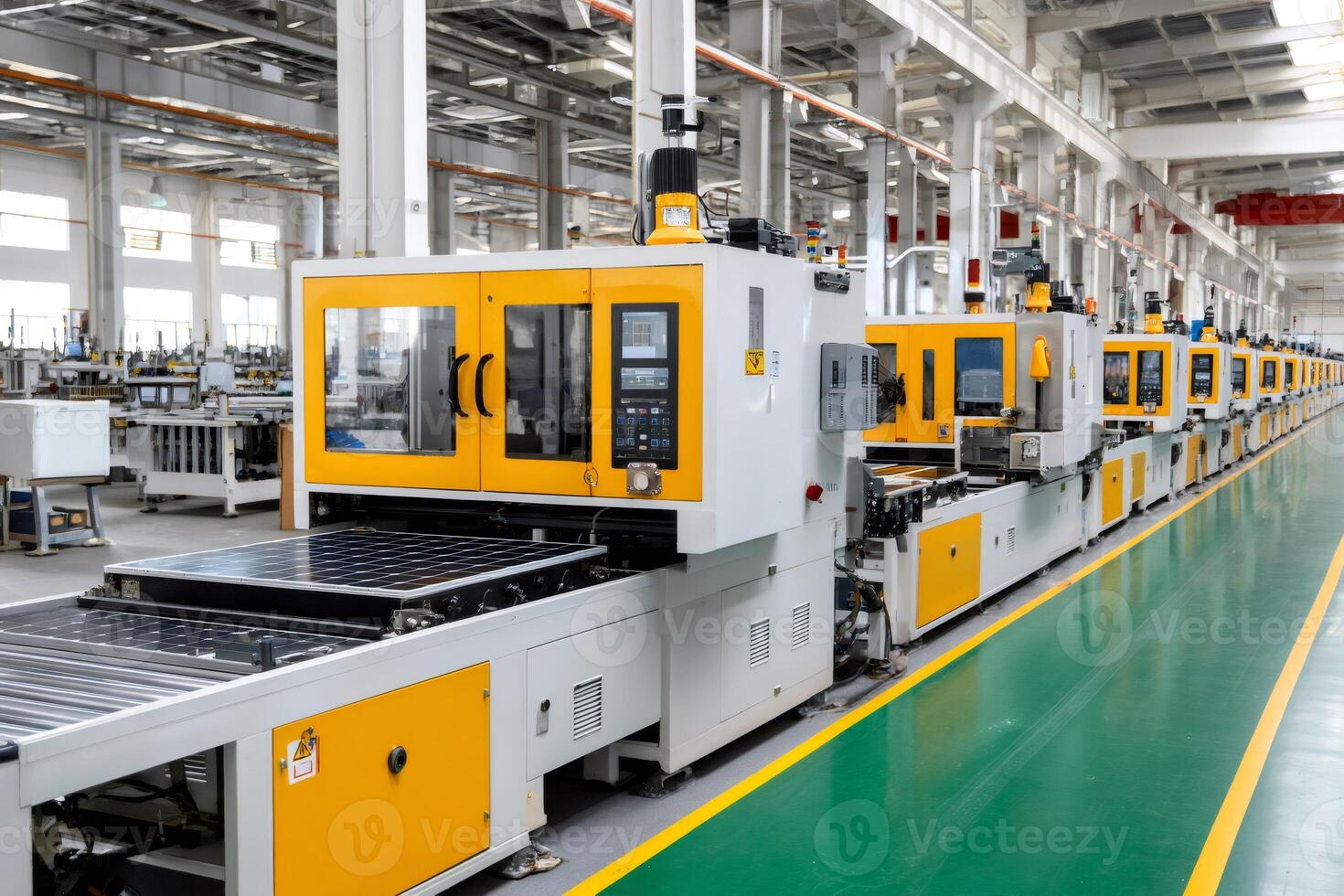 Solar panel manufacturing process using automated machinery in factory photo