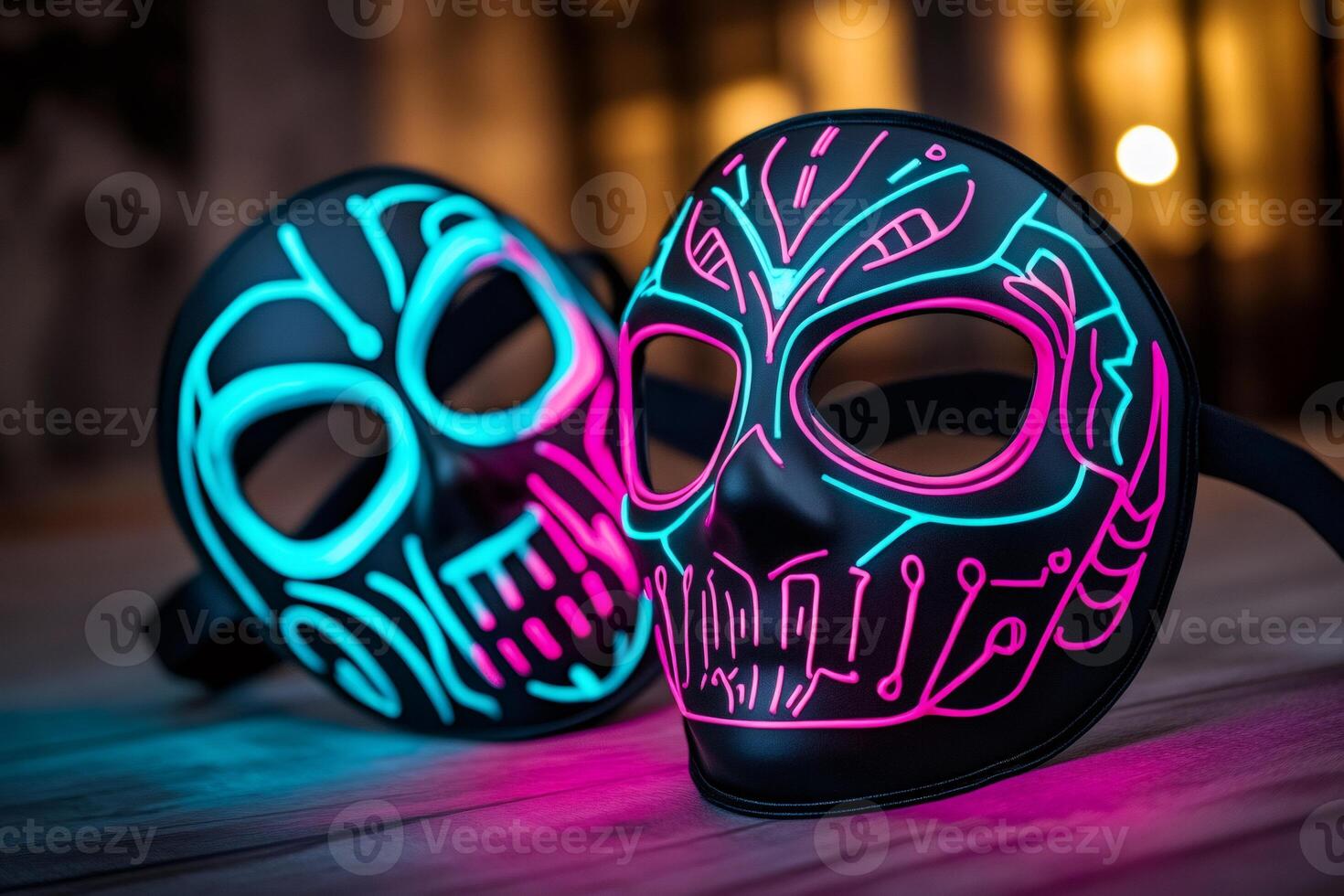 Two light up skull masks glowing on tabletop photo