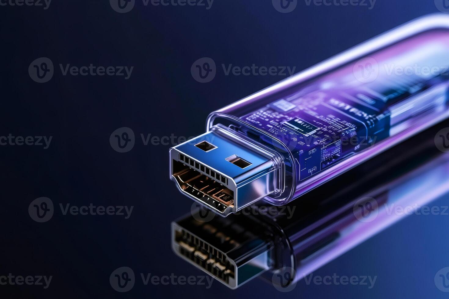 Transparent usb drive showing internal circuitry reflecting on dark surface photo