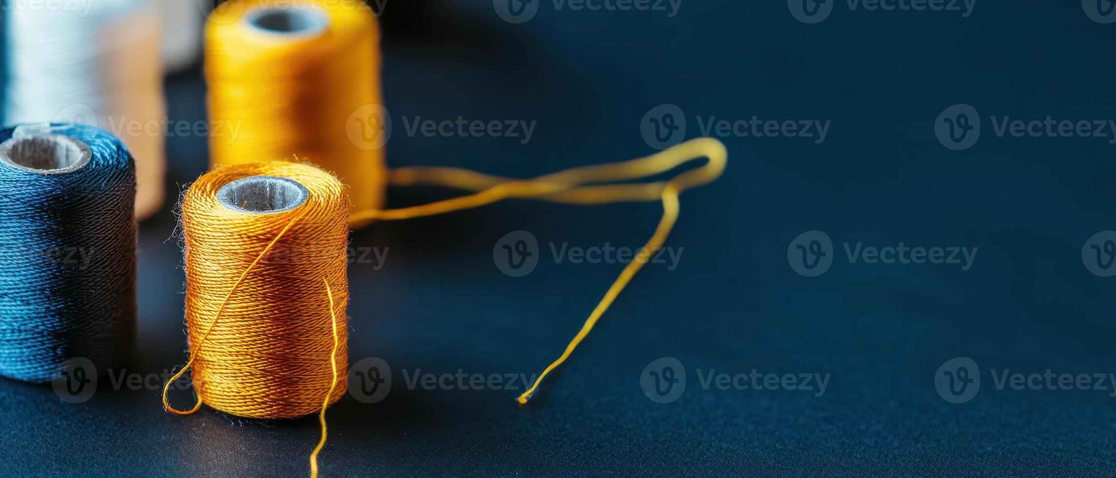Colorful sewing threads create artistic patterns photo