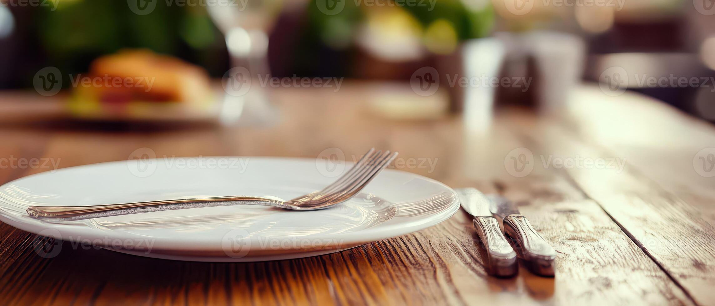 Dining table setup with silverware photo
