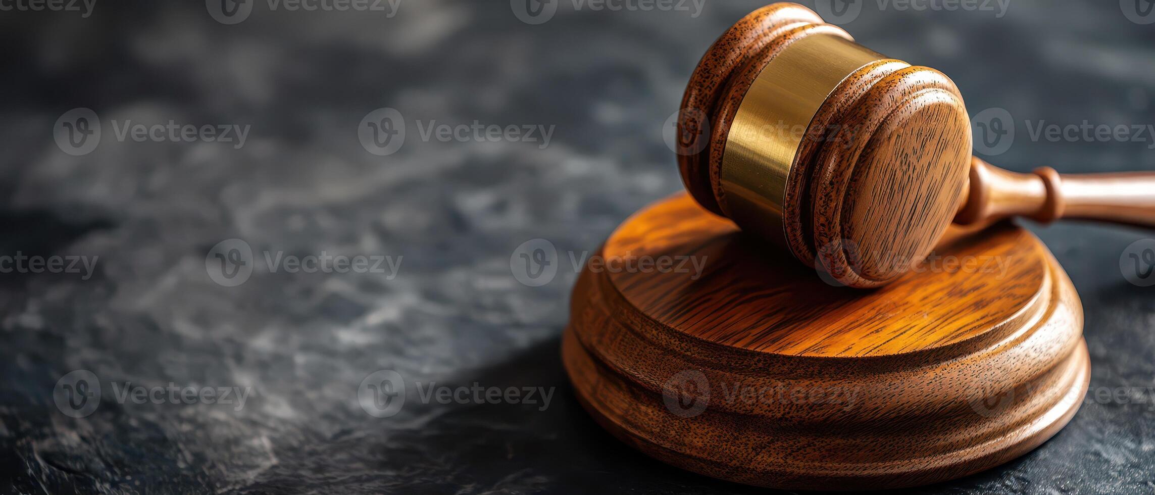 Wooden gavel rests on a round base ready for court photo