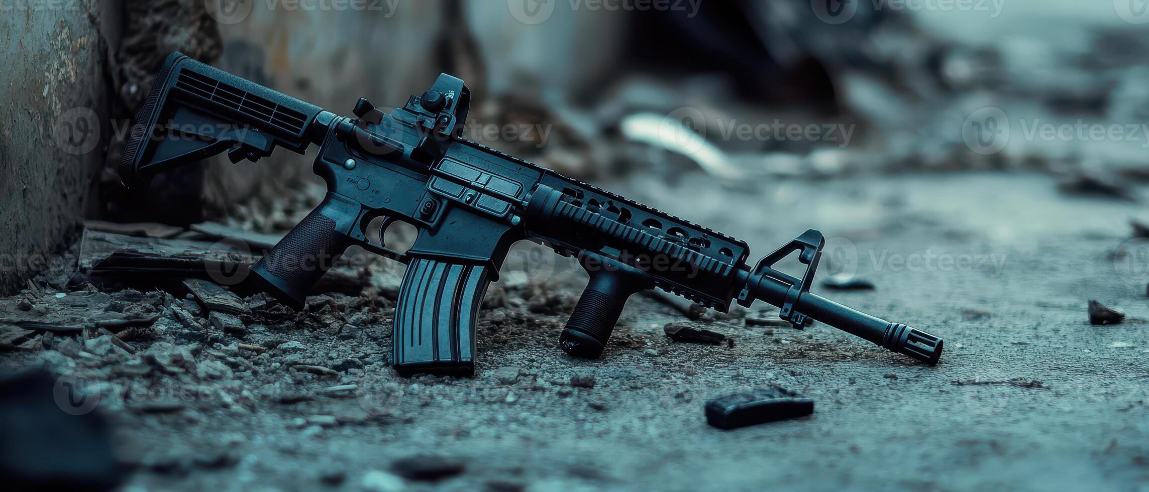 Rifle resting on the ground in an abandoned area photo
