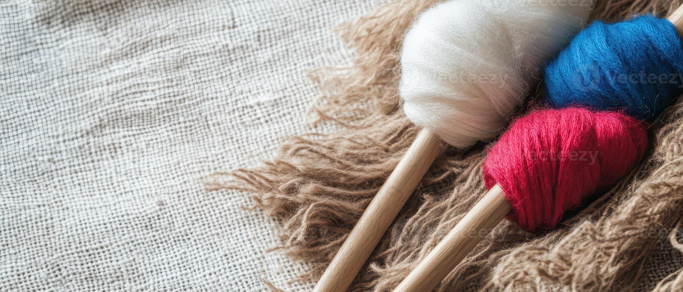 Colorful wool on natural fabric photo