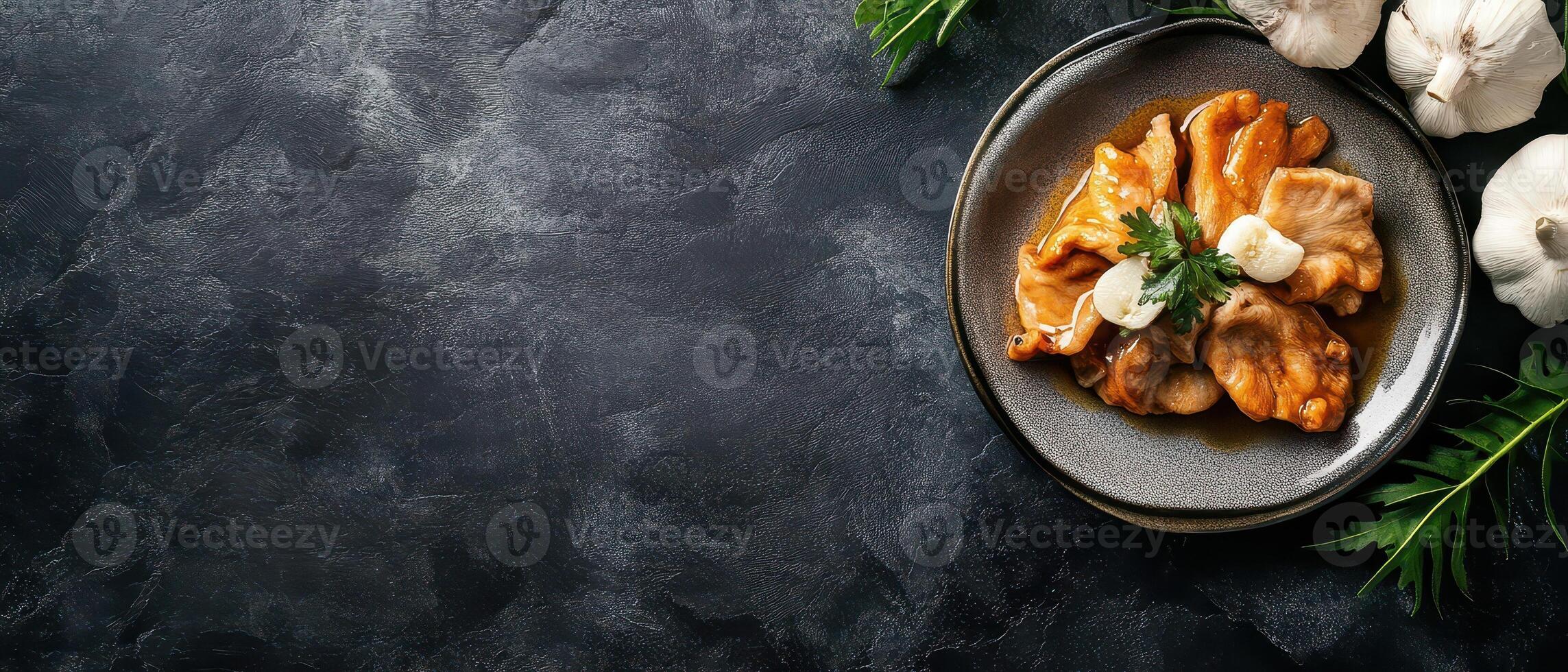 A plate of chicken with herbs and spices photo