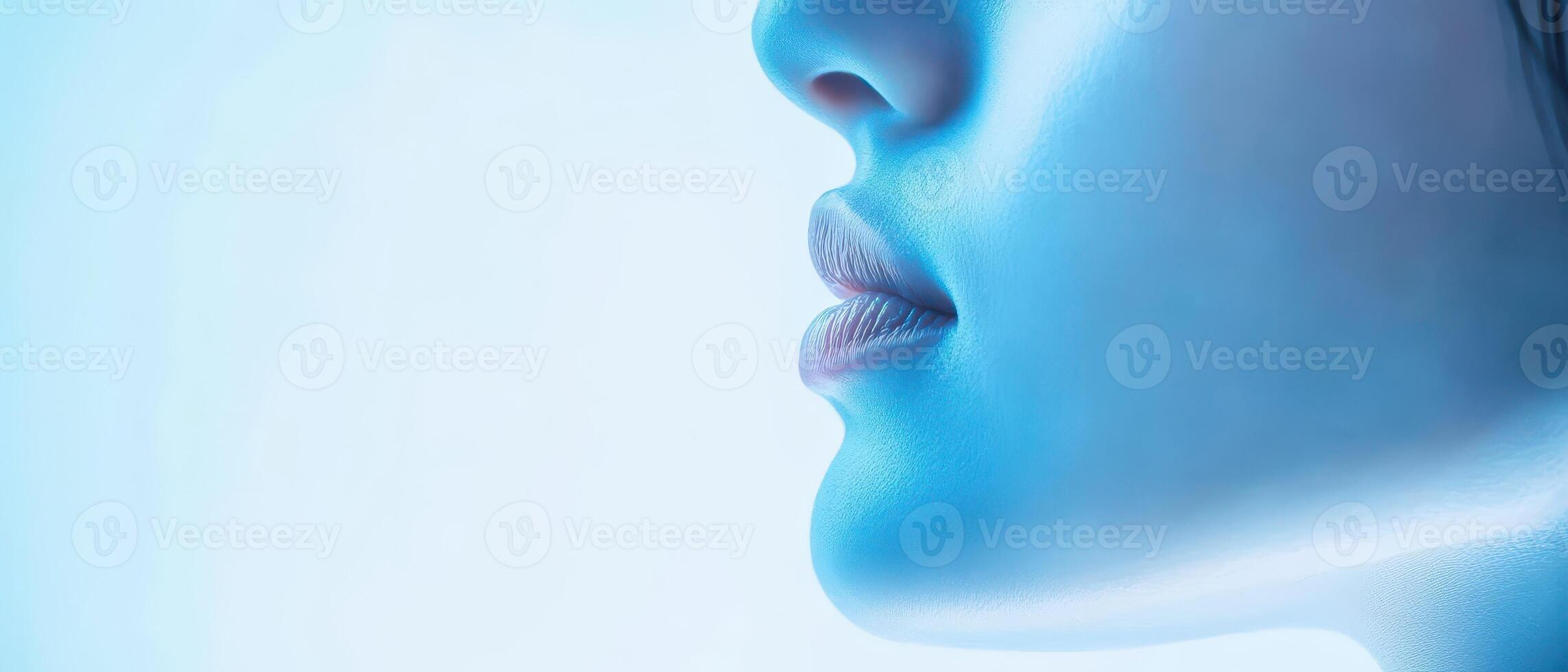 Blue toned portrait of a serene young woman photo