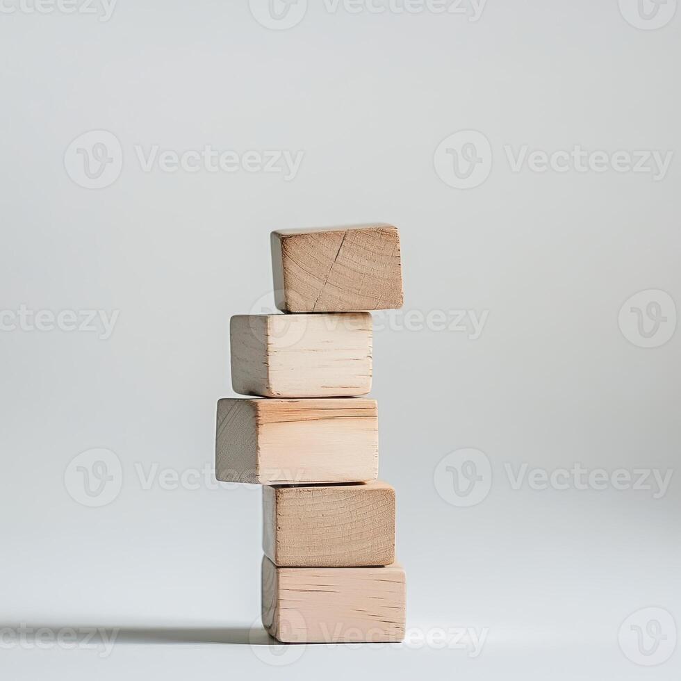 Stack of wooden blocks arranged neatly indoors photo