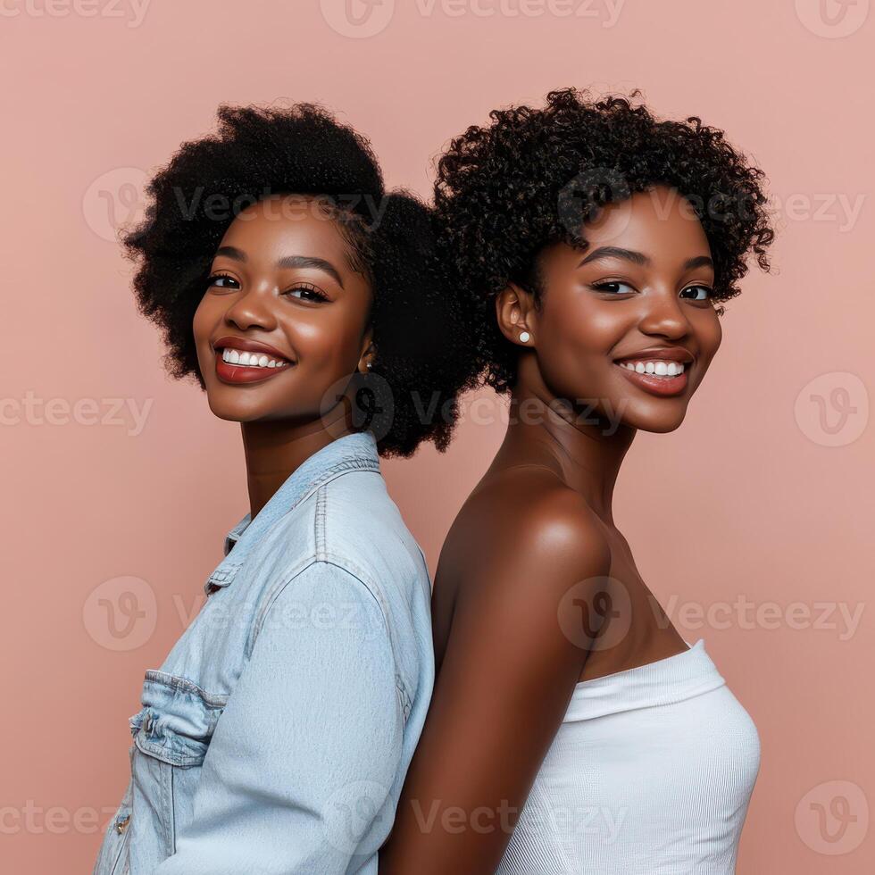 Two friends smiling against a pastel background photo