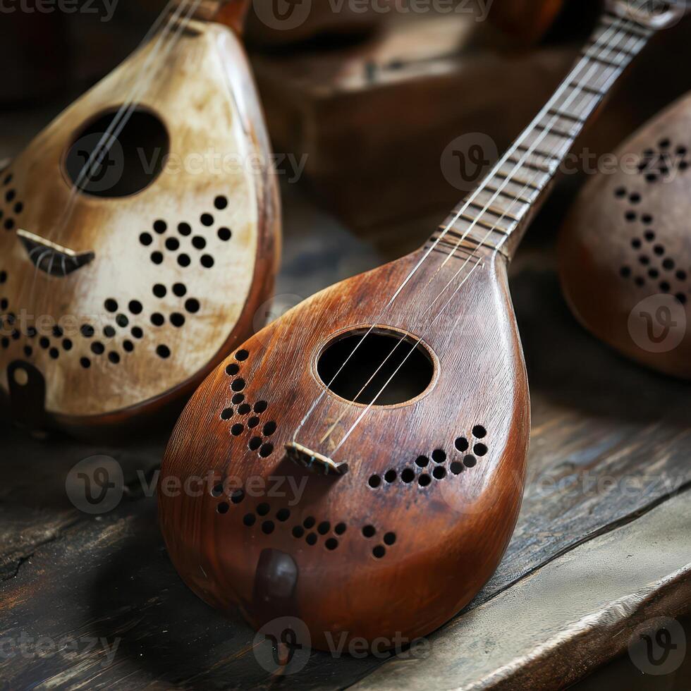 Wooden string instruments on rustic table photo