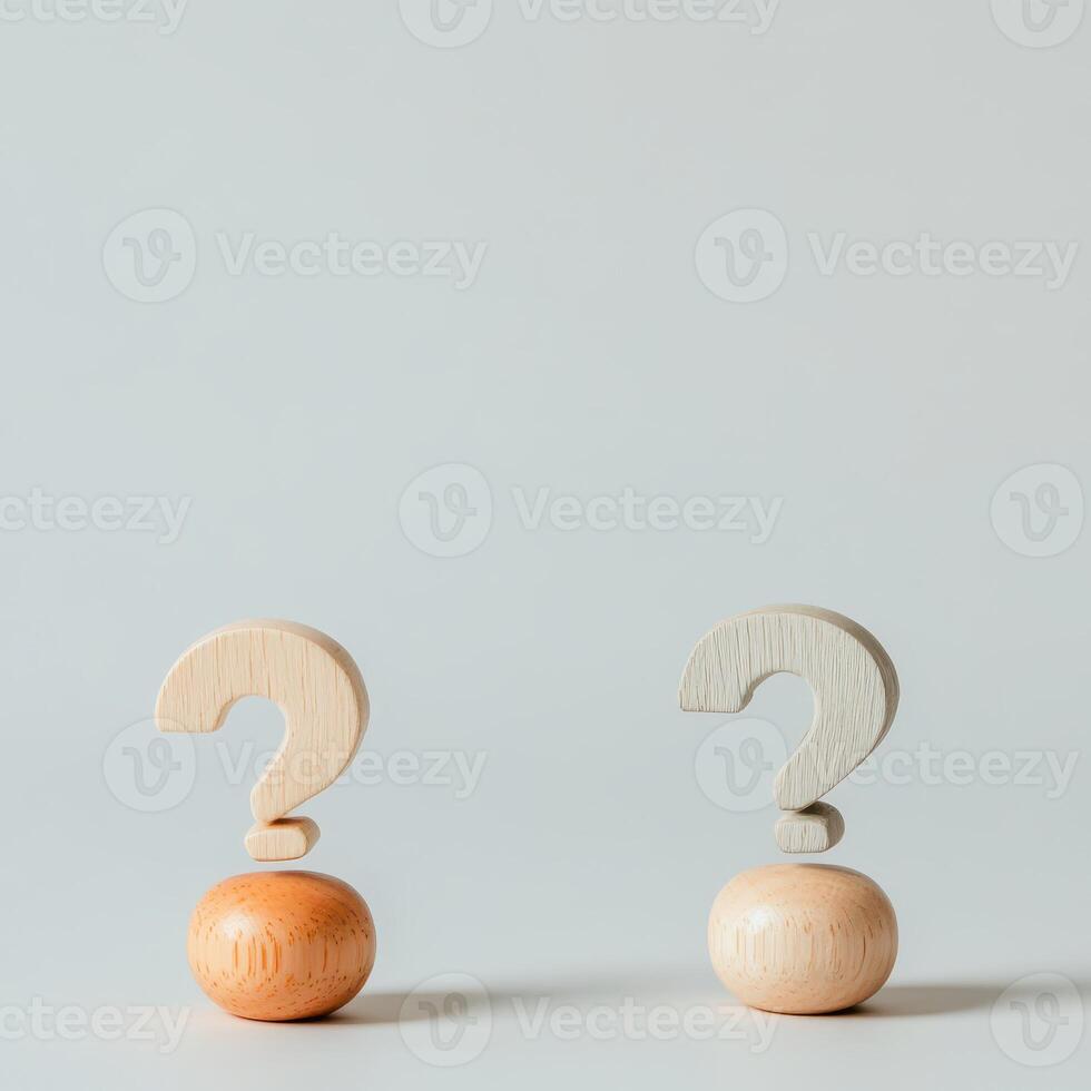 Wooden question marks on balls represent curiosity photo