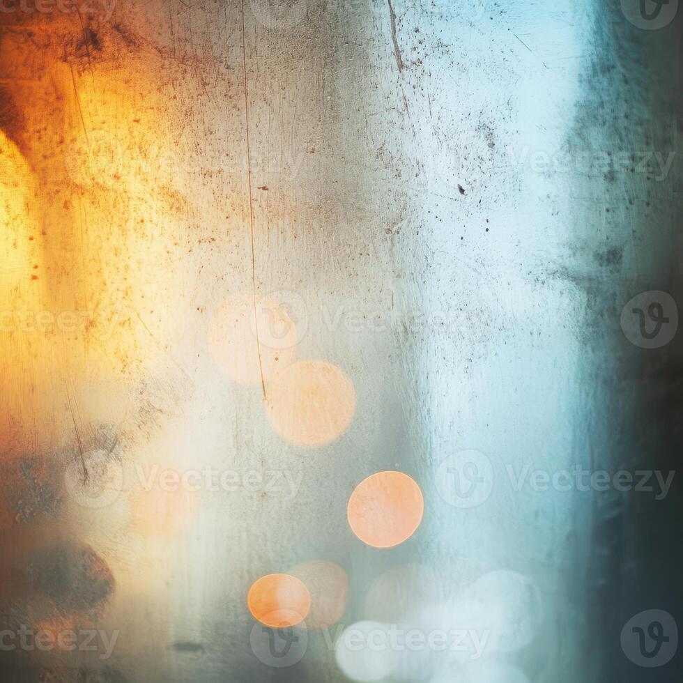 Reflections through a wet window with city lights photo