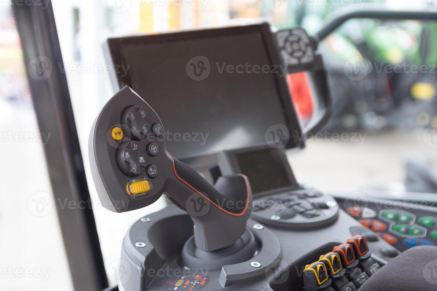 The cabin and control stick tractor of a modern tractor photo